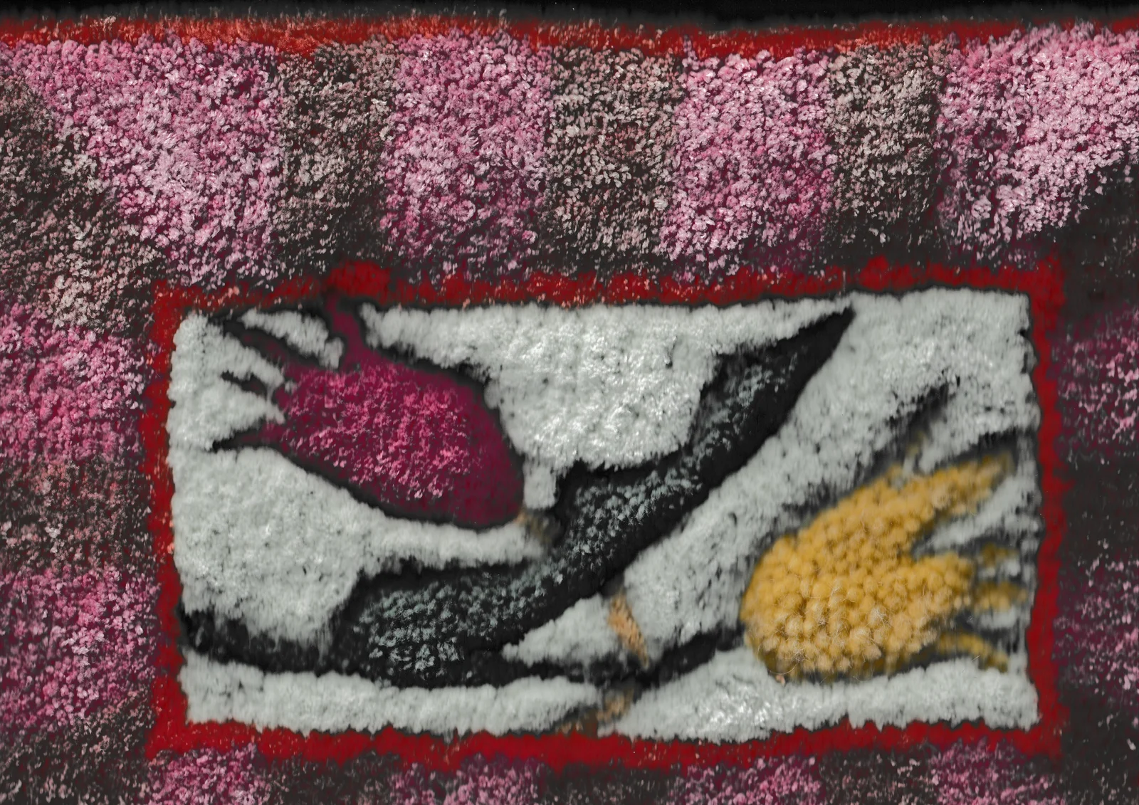 Pink, white, black and yellow organic forms in a hand-tufted rug